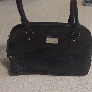 Black snakeskin style bag